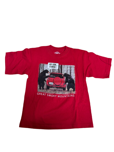 Red Shirt with photo of two bears looking at red vehicle with a stick family on the back window. Reading 