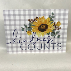 "Kindness Counts" wood sign with flower